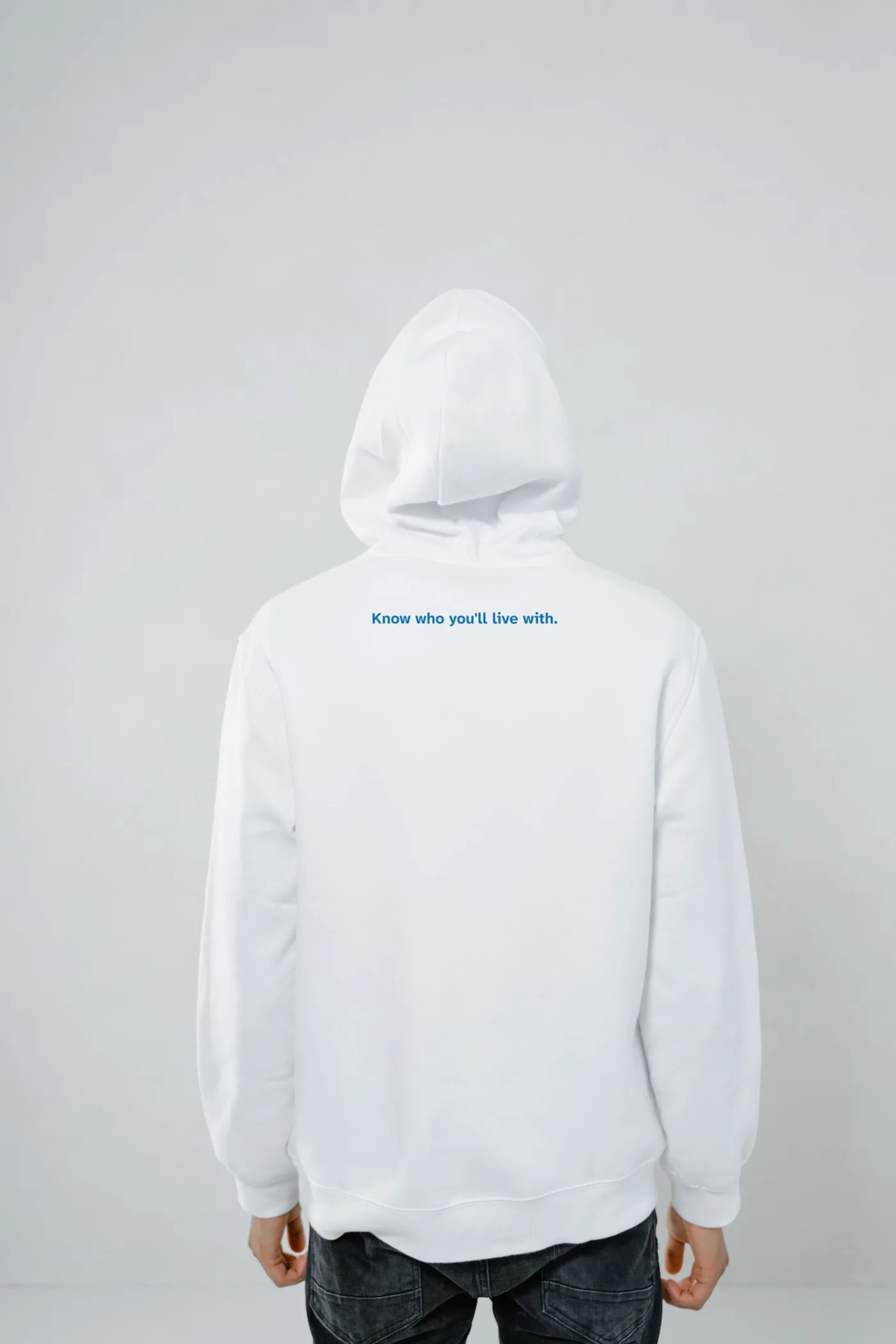 The tagline on the back, small, like a label