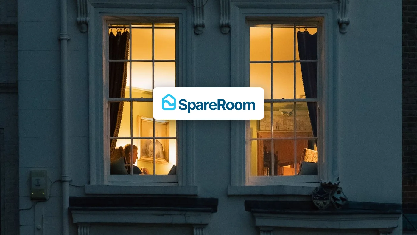The official SpareRoom logo over a lit London window